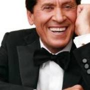 The lyrics DIMMI ADESSO CON CHI SEI of GIANNI MORANDI is also present in the album L'amore ci cambia la vita (2002)