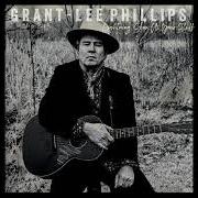 The lyrics COMING TO of GRANT LEE PHILLIPS is also present in the album Lightning, show us your stuff (2020)