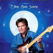The lyrics WALKING IN A HURRICANE of JOHN FOGERTY is also present in the album Blue moon swamp (1997)