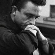 The lyrics WAYFARING STRANGER of JOHNNY CASH is also present in the album American iii: solitary man (2000)