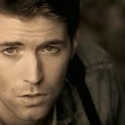 The lyrics SHE'LL GO ON YOU of JOSH TURNER is also present in the album Long black train (2003)