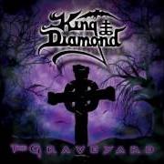 The lyrics WHISPERS of KING DIAMOND is also present in the album The graveyard (1996)